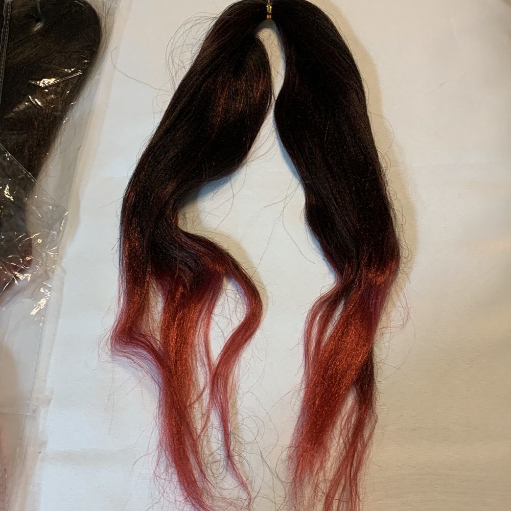 Eight strands of synthetic black/red hair extensions for weaving. NWT